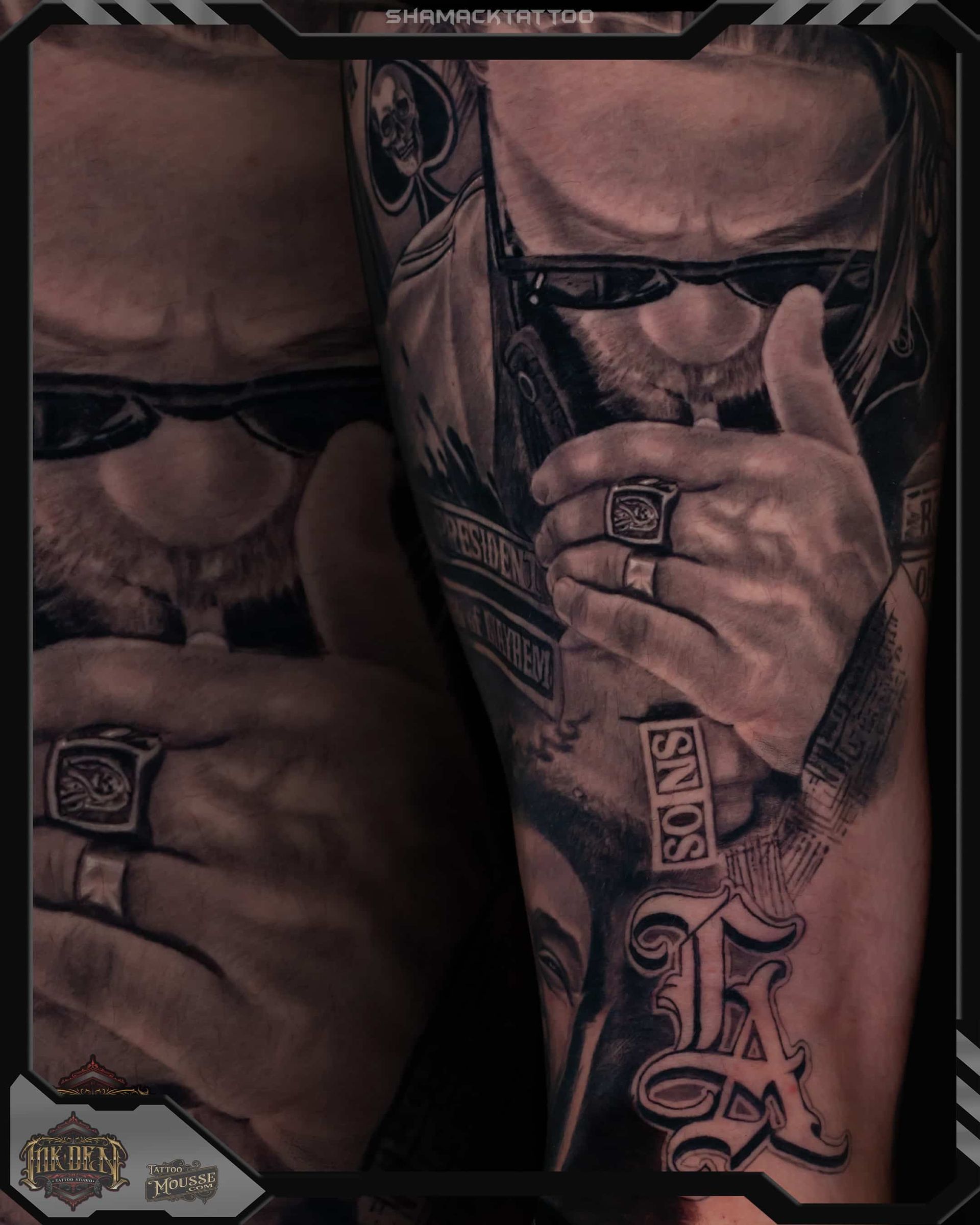 Tattooed man wearing glasses, hand over mouth, in a dark split-panel portrait.