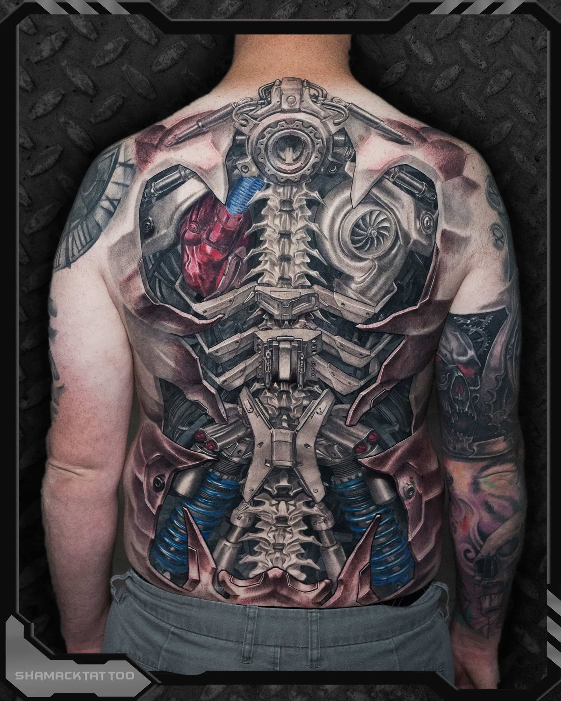 back-biomechanical-mechtattoo-tattoo-Shamack-tattoo-inkden