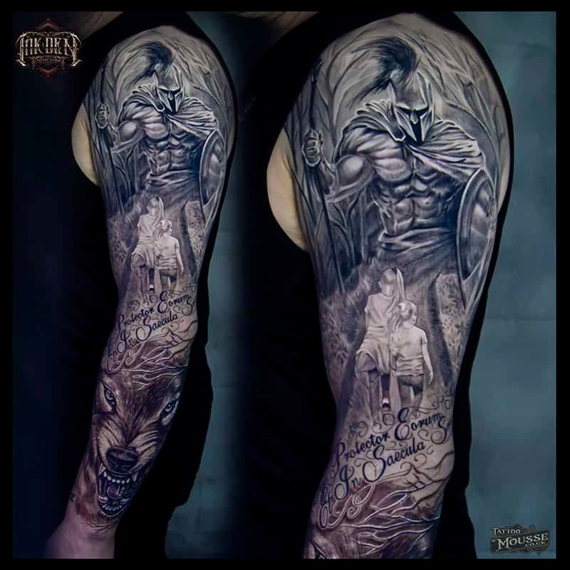 Side-by-side black-and-gray thigh tattoos featuring a robed figure and a child on a dark background